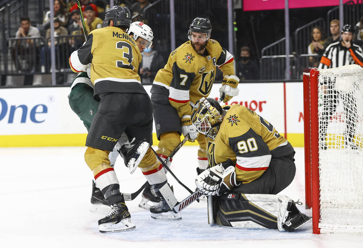 Golden Knights goaltender Robin Lehner (90) makes a save against the Minnesota Wild during the ...