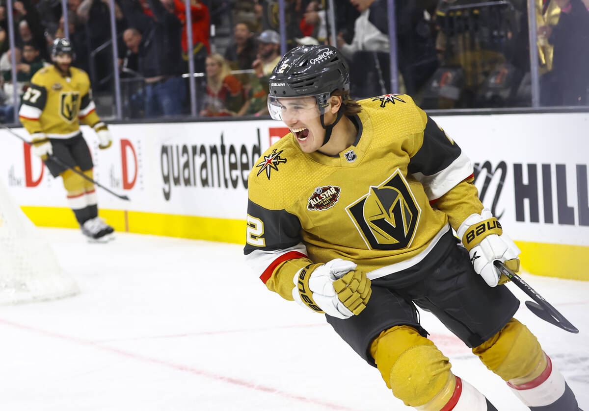 Golden Knights defenseman Zach Whitecloud (2) celebrates after his goal against the Minnesota W ...