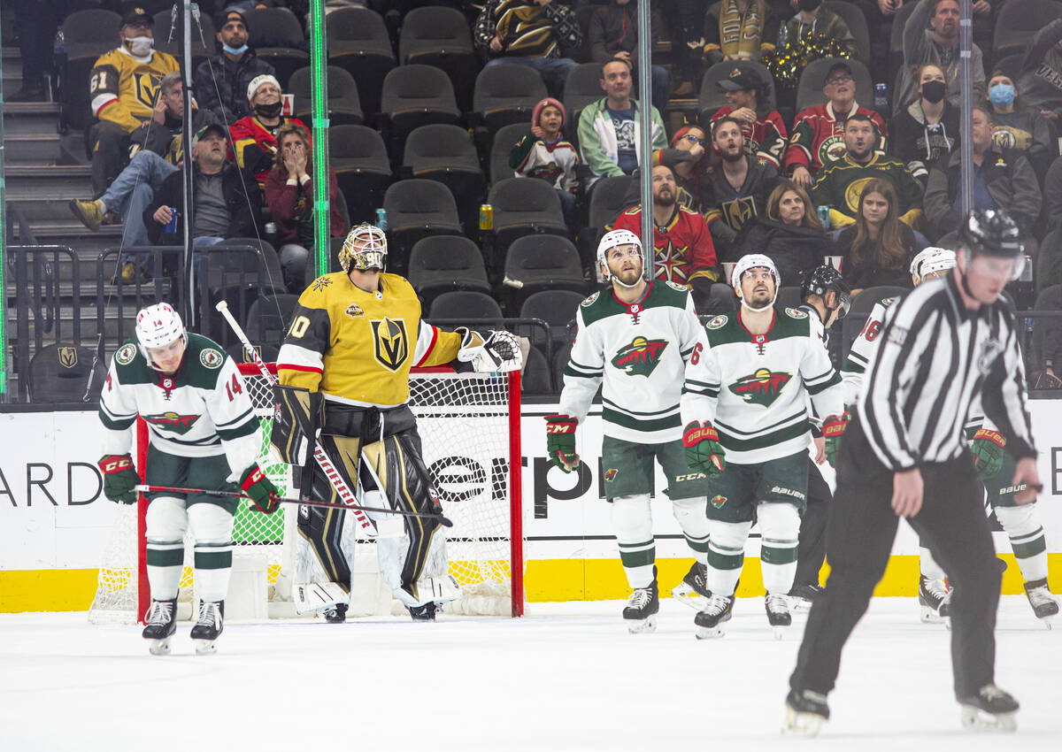 Golden Knights goaltender Robin Lehner (90) looks on after giving up a goal to the Minnesota Wi ...