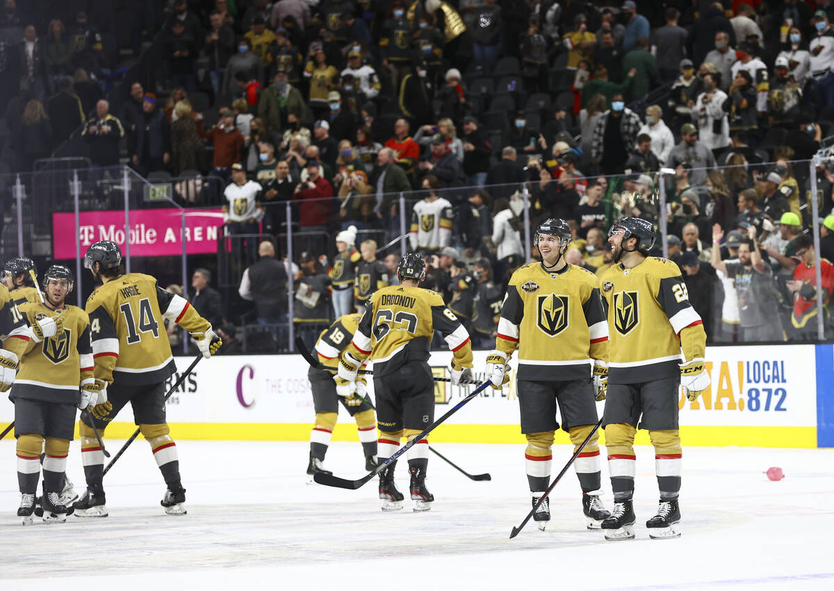The Golden Knights celebrate after defeating the Minnesota Wild in an NHL hockey game at T-Mobi ...