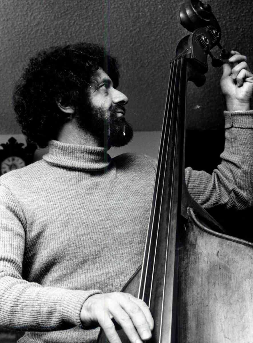 Gus Mancuso is shown tuning a stand-up bass in this 1979 photo. (Review-Journal file)