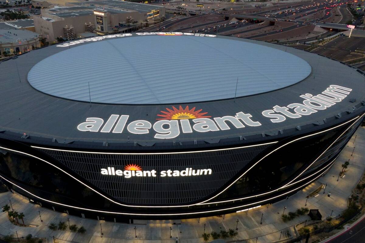 Aerial view of Allegiant Stadium and the Las Vegas Strip on Tuesday, December 7, 2021. (Michael ...