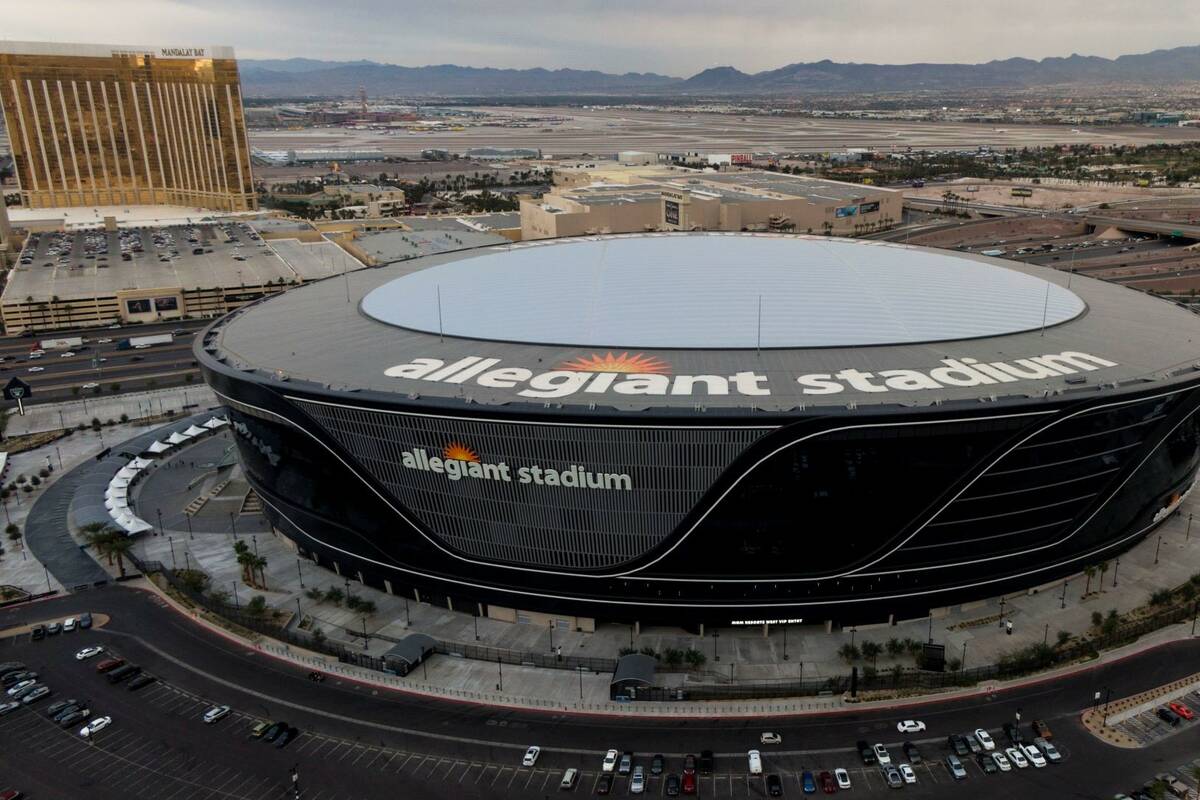 Aerial view of Allegiant Stadium and the Las Vegas Strip on Tuesday, December 7, 2021. (Michael ...