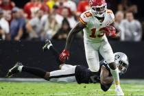 Kansas City Chiefs wide receiver Byron Pringle (13) breaks free from Raiders cornerback Casey H ...