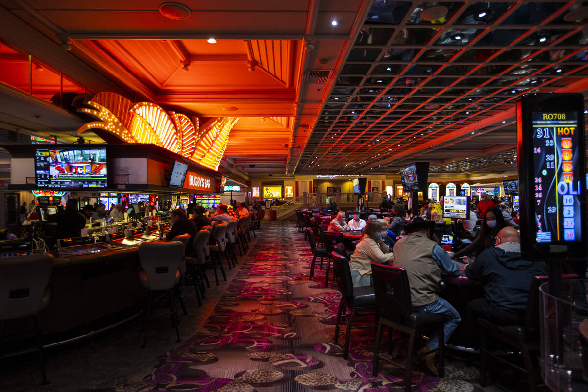 BugsyÕs Bar, left, is pictured near table games at the Flamingo in Las Vegas on Wednesday, ...