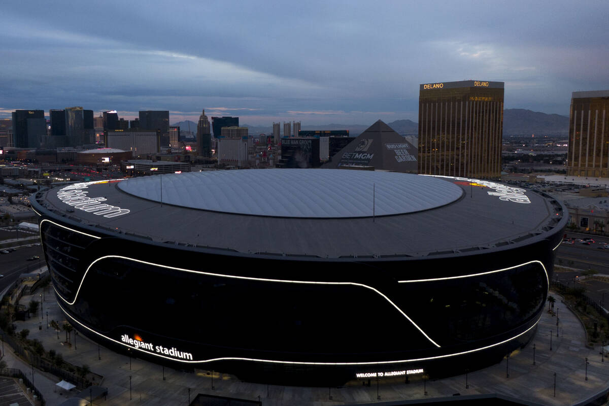 Aerial view of Allegiant Stadium and the Las Vegas Strip on Tuesday, December 7, 2021. (Michael ...