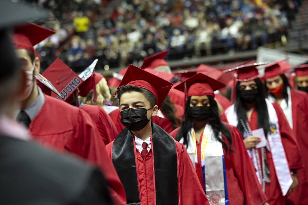 Jack Rico, a 15-year-old UNLV graduate in history, lines up to take the stage during his commen ...