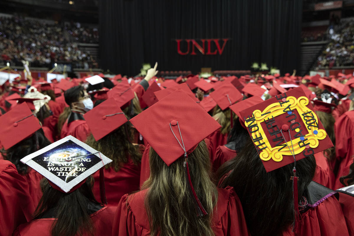 Some UNLV graduates decorated their caps for their commencement at the Thomas & Mack Center ...