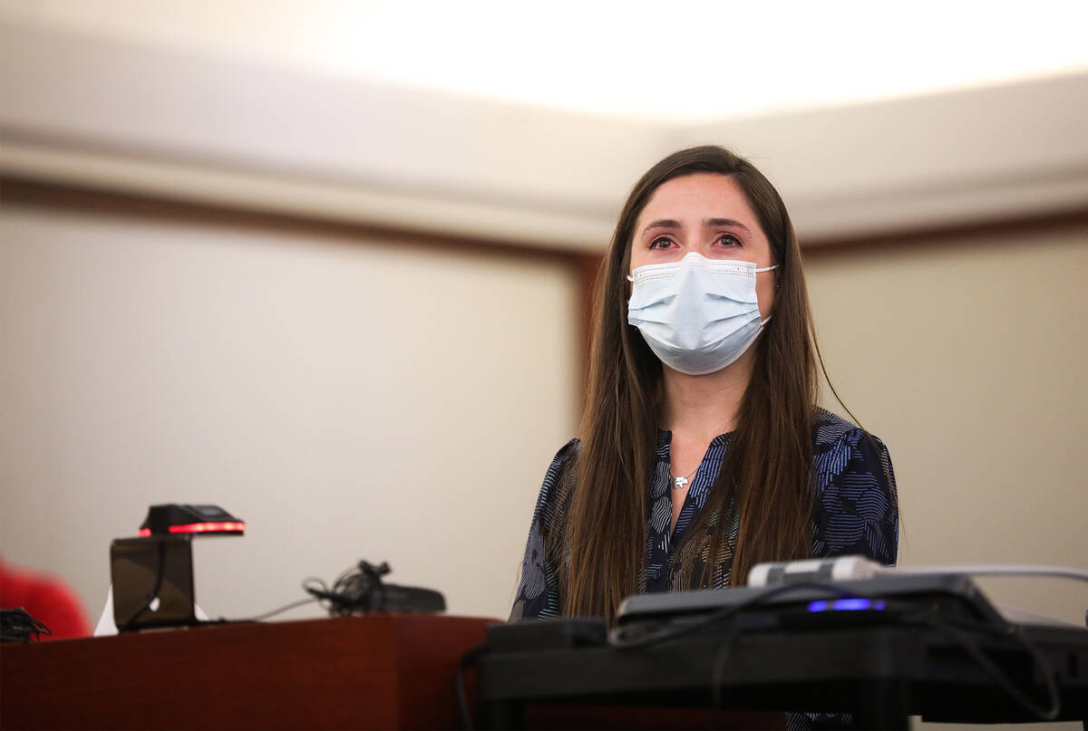 Sarah Woolsey, daughter of Tom Trauger, reads her victim impact statement to the court during a ...