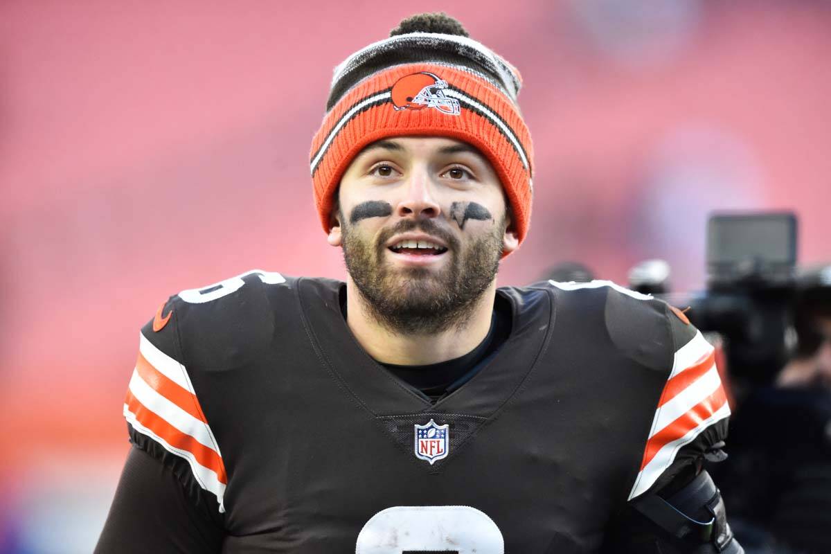 Cleveland Browns quarterback Baker Mayfield walks off the field after his team defeated the Bal ...