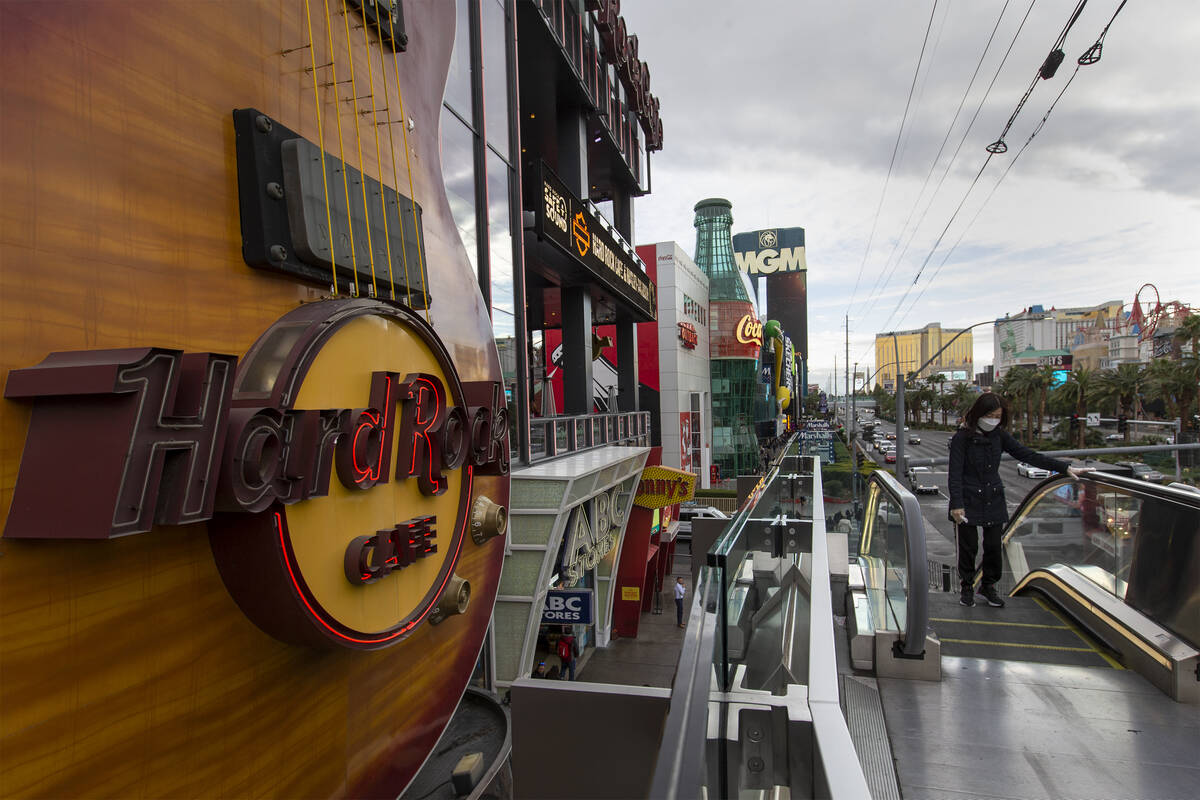 An enormous guitar adorns the outside of a Hard Rock Cafe on Thursday, Dec. 16, 2021, on the La ...