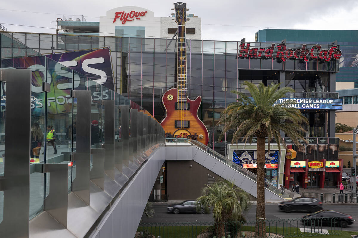 An enormous guitar adorns the outside of a Hard Rock Cafe on Thursday, Dec. 16, 2021, on the La ...