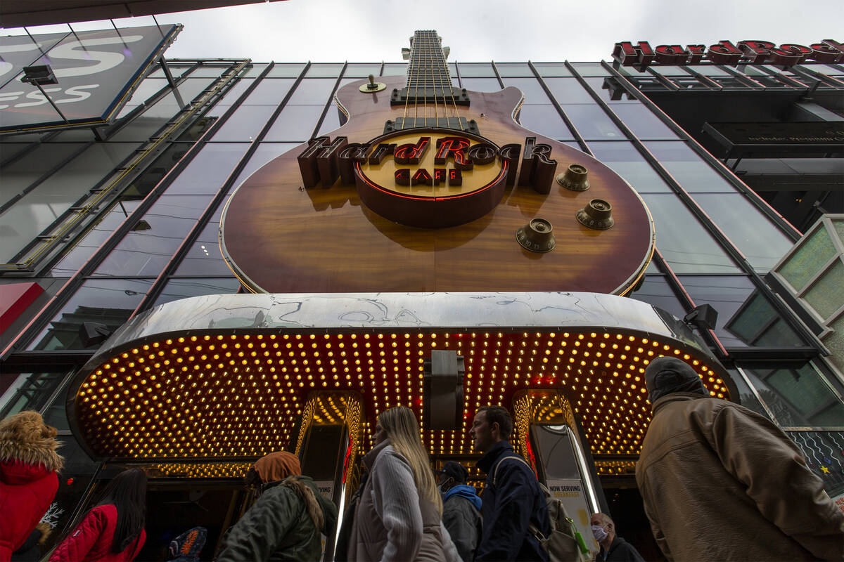 An enormous guitar adorns the outside of a Hard Rock Cafe on Thursday, Dec. 16, 2021, on the La ...