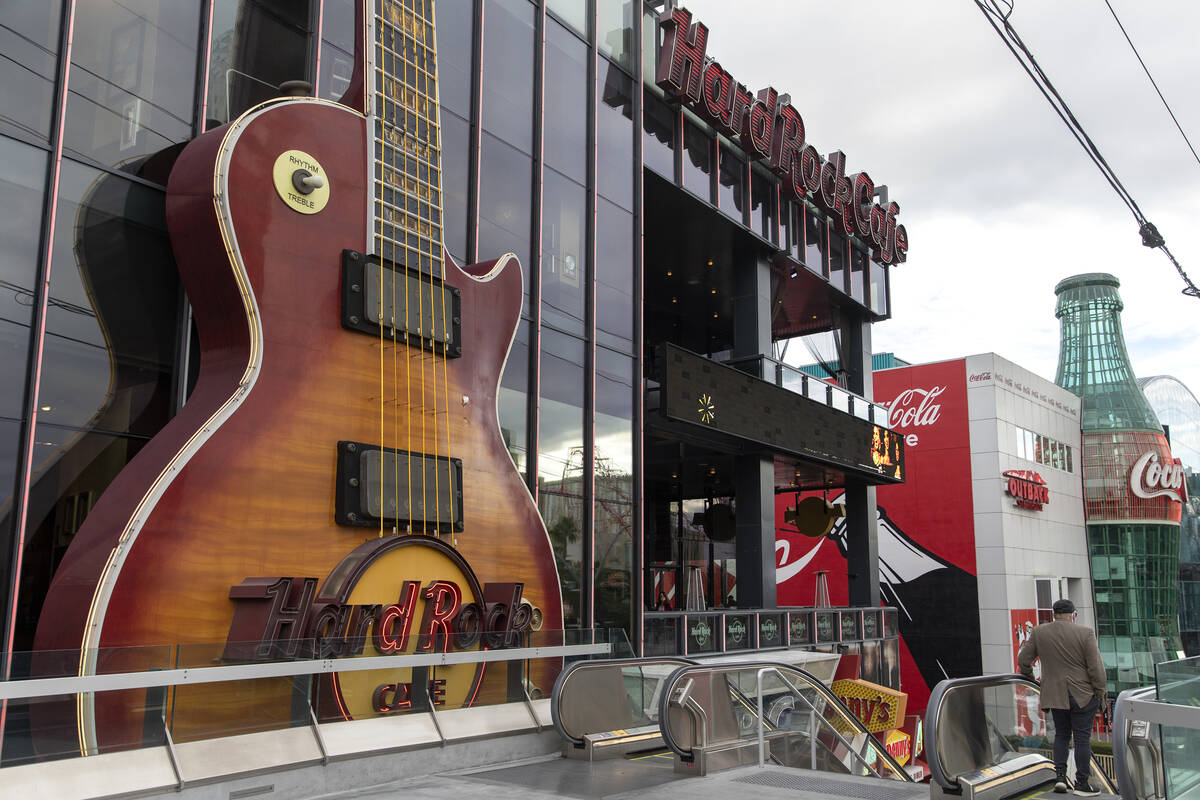 An enormous guitar adorns the outside of a Hard Rock Cafe on Thursday, Dec. 16, 2021, on the La ...