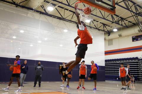 Keenan Bey goes to the basket during a basketball practice at Bishop Gorman High School, Friday ...