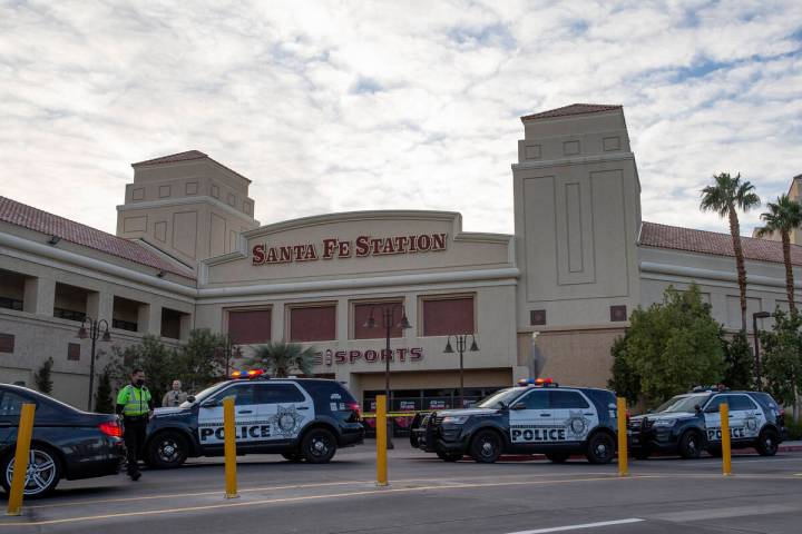 Las Vegas police investigate a shooting at Santa Fe Station on Thursday, Dec. 16, 2021, in Las ...