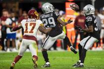 Raiders cornerback Casey Hayward (29) attempts to make an interception past Washington Football ...