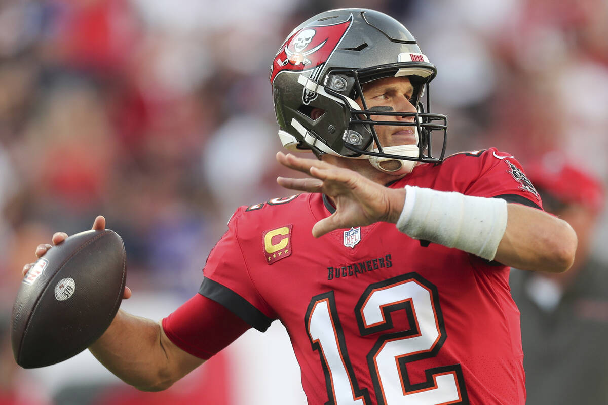 Tampa Bay Buccaneers quarterback Tom Brady (12) warms up during a NFL football game against the ...