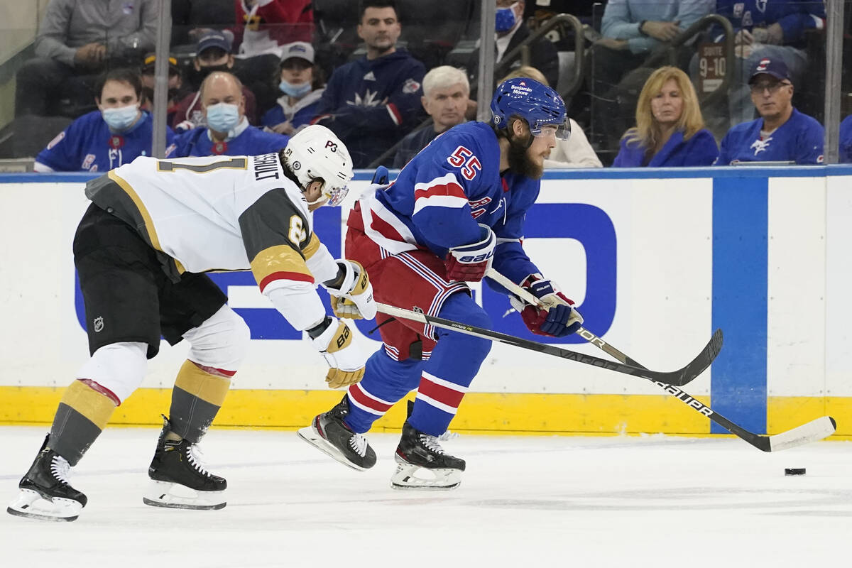 New York Rangers defenseman Ryan Lindgren (55) skates against Vegas Golden Knights center Jonat ...