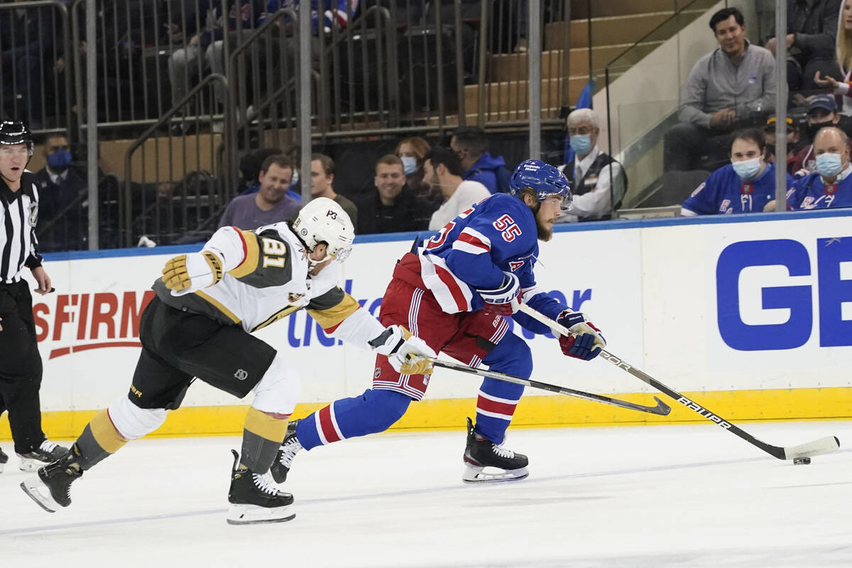 New York Rangers defenseman Ryan Lindgren (55) skates against Vegas Golden Knights center Jonat ...