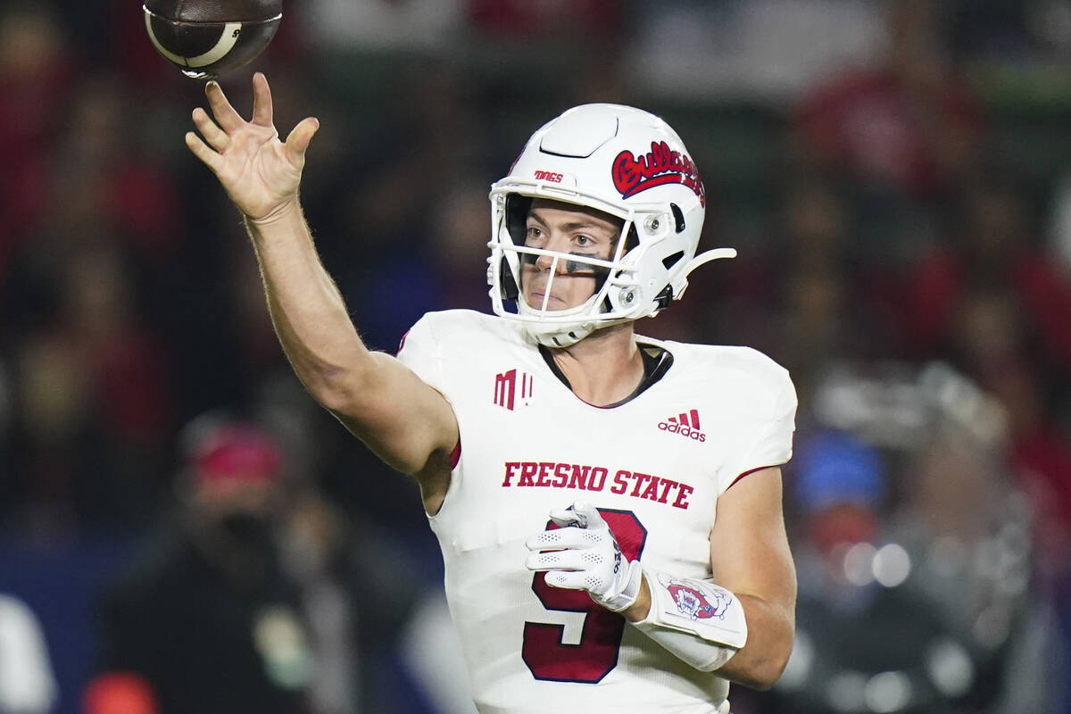 Fresno State quarterback Jake Haener throws a pass during the first half of an NCAA college foo ...