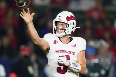 Fresno State backmost   Jake Haener throws a walk  during the archetypal  fractional  of an NCAA assemblage   foo ...