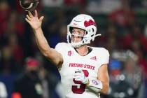 Fresno State quarterback Jake Haener throws a pass during the first half of an NCAA college foo ...