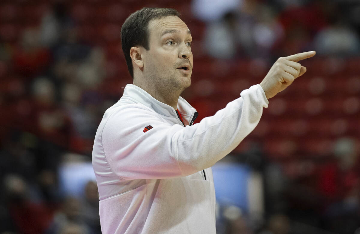 UNLV Rebels head coach Kevin Kruger makes a call in the second half of an NCAA mens basketball ...