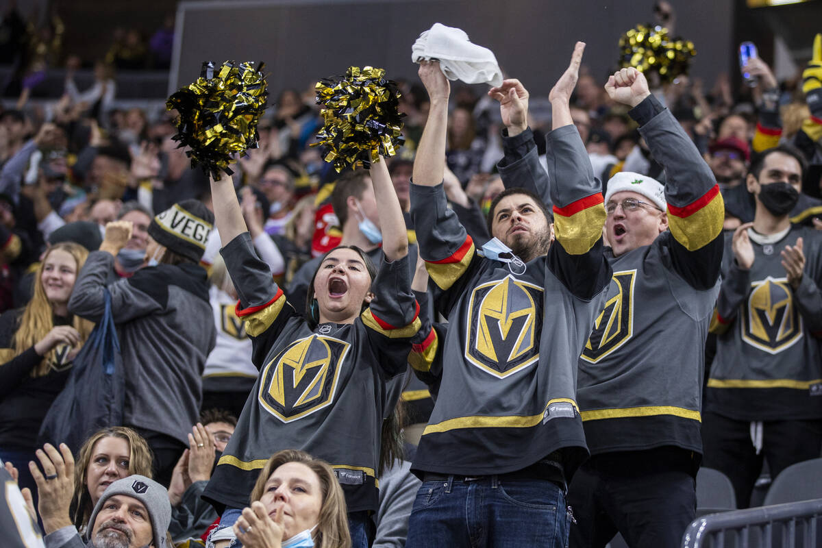 Golden Knights fans celebrate a goal over the Columbus Blue Jackets during the second period of ...