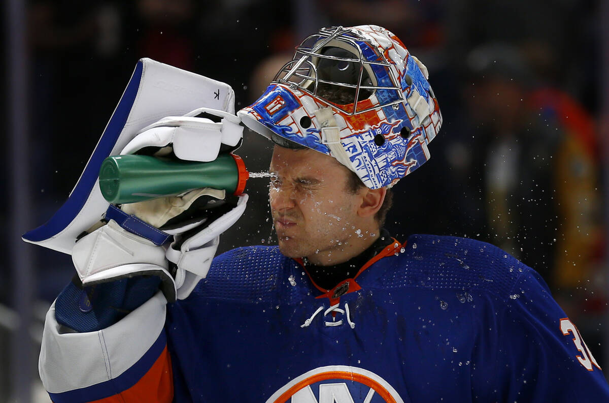 New York Islanders' goalie Ilya Sorokin cools off before an NHL hockey game against the Vegas G ...