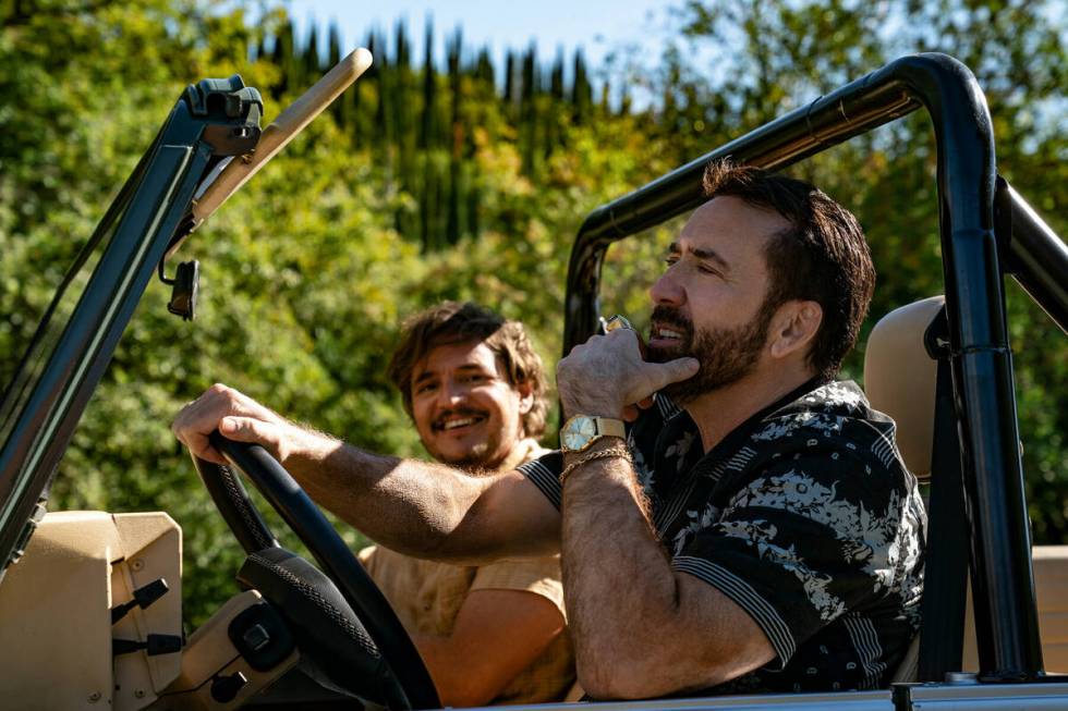 Pedro Pascal as Javi and Nicolas Cage as Nic Cage in "The Unbearable Weight of Massive Talent." ...