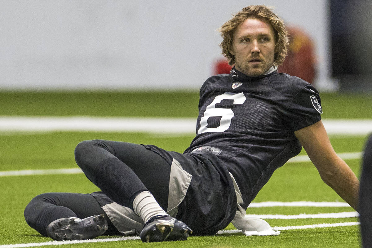 Las Vegas Raiders punter AJ Cole (6) stretches with teammates during warm ups at the Intermount ...