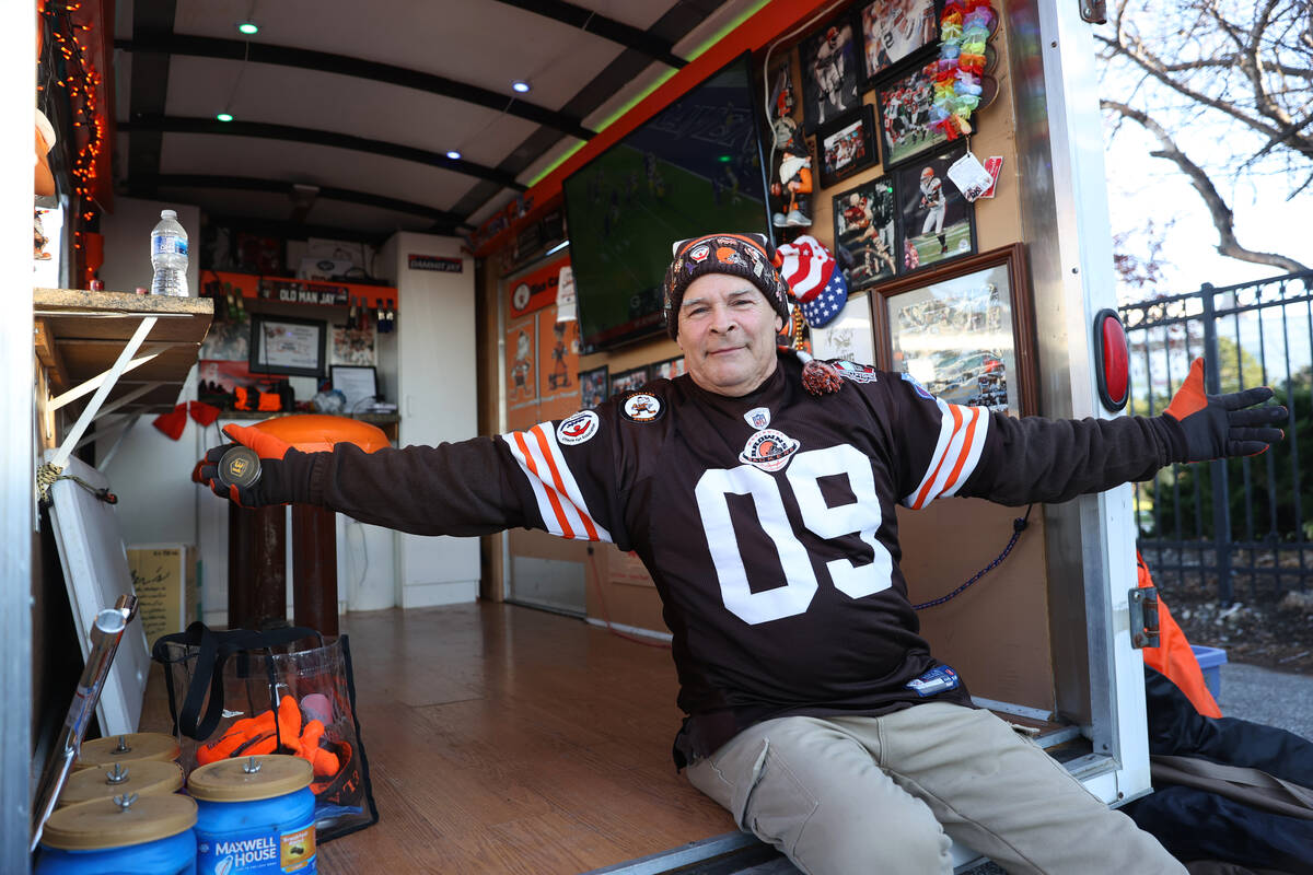Jay Negin tailgates before an NFL football game between the Raiders and the Cleveland Browns at ...