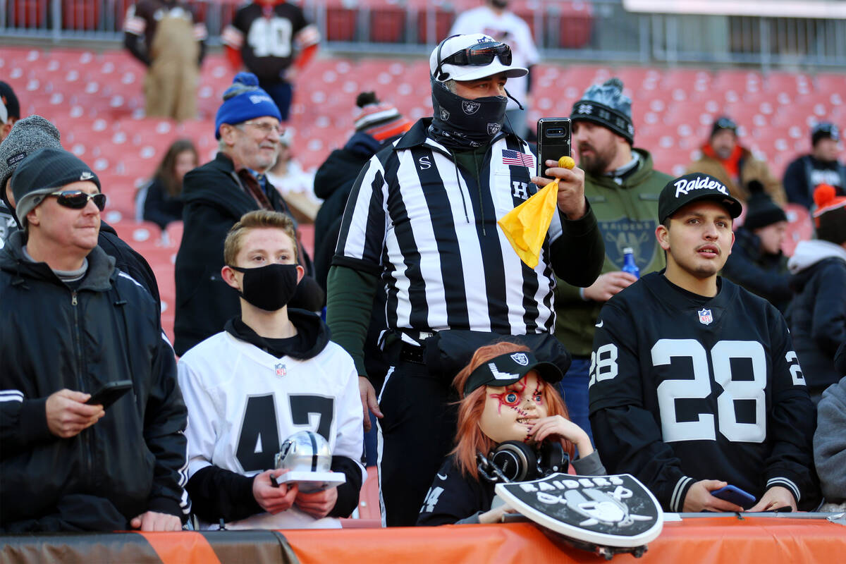 Fans attend an NFL football game between the Raiders and the Cleveland Browns at the FirstEnerg ...