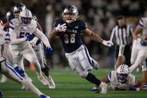 UNR running back Toa Taua carries against Colorado State during an NCAA college football game S ...
