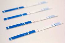 This May 10, 2018, file photo shows an arrangement of fentanyl test strips in New York. (AP Pho ...