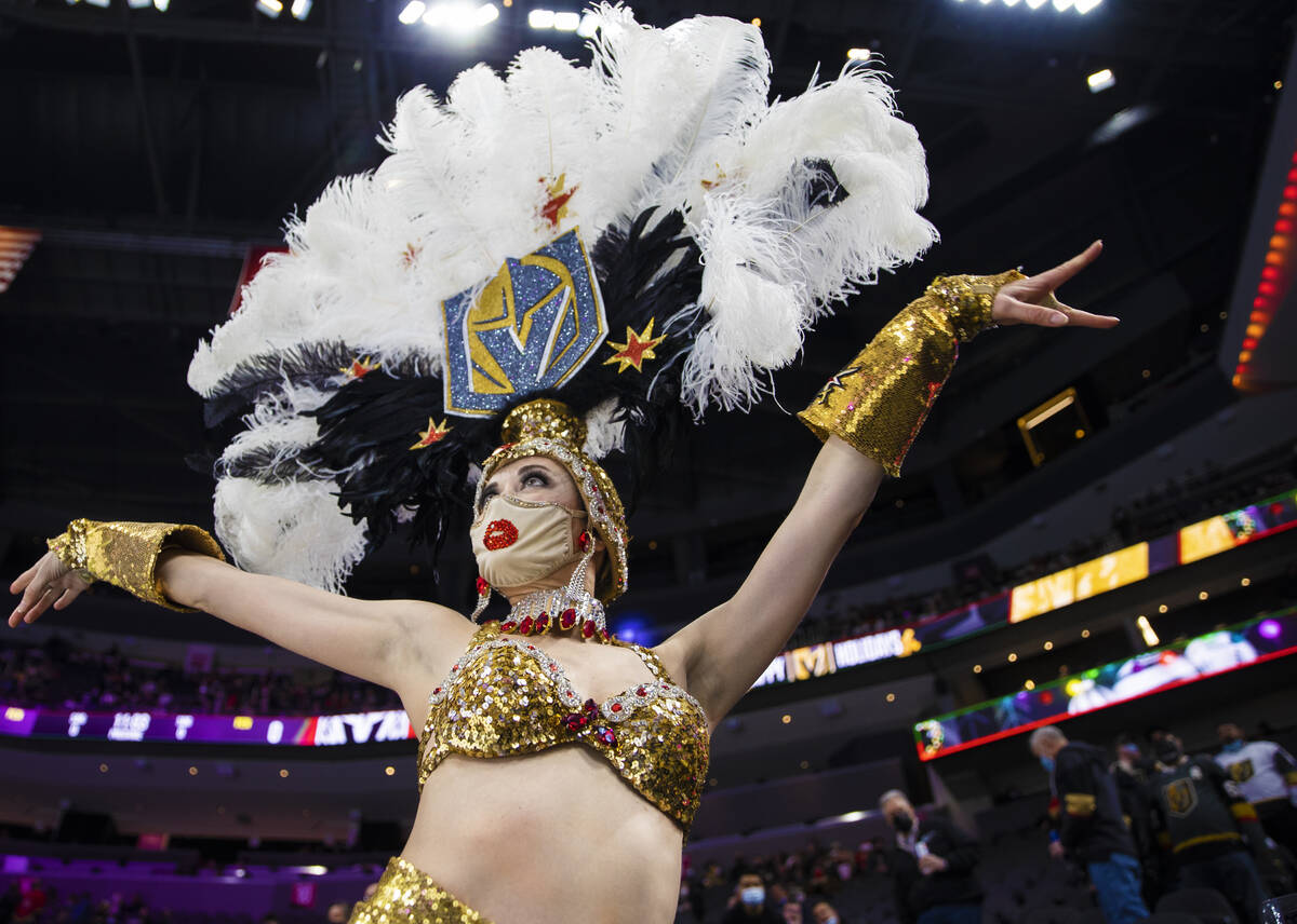 The Golden Belles dance before the start of the Golden Knights NHL hockey game against the Tamp ...