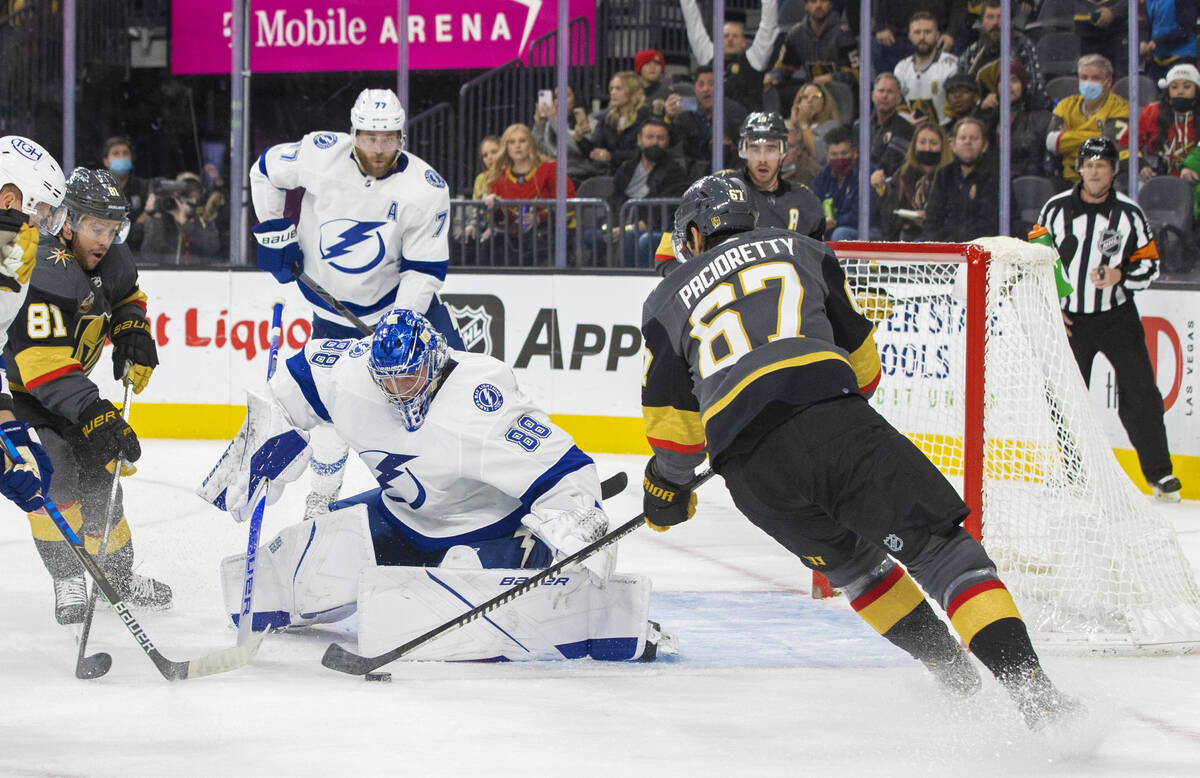 Vegas Golden Knights left wing Max Pacioretty (67) shoots on Tampa Bay Lightning goaltender And ...