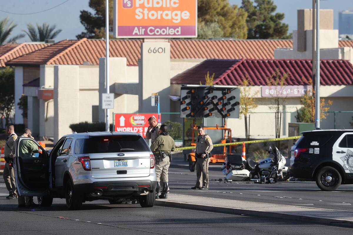 A Las Vegas police officer was injured Tuesday afternoon by a hit-and-run motorist at the inter ...