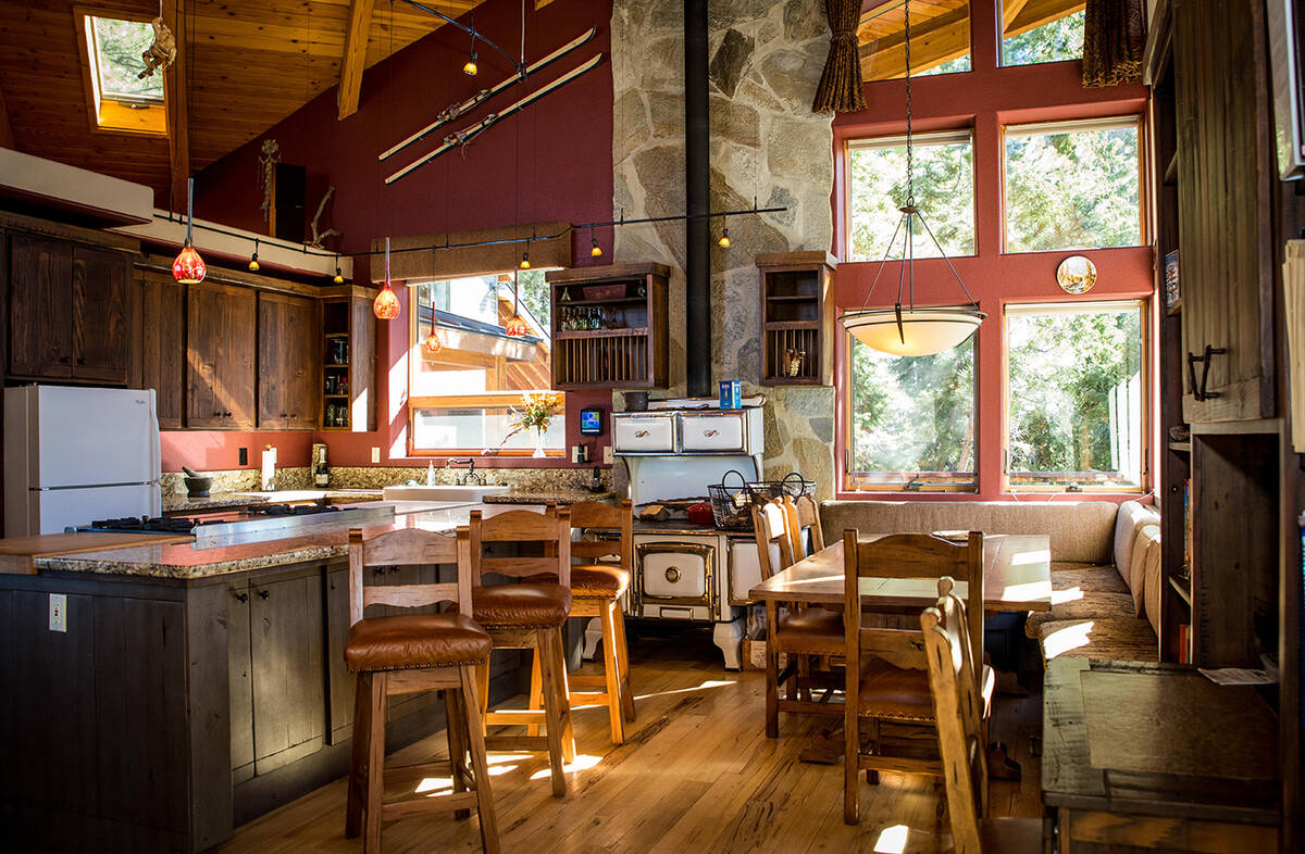 A Utah custom furniture builder made the cabinets, door and other wood furnishings in the Lee C ...