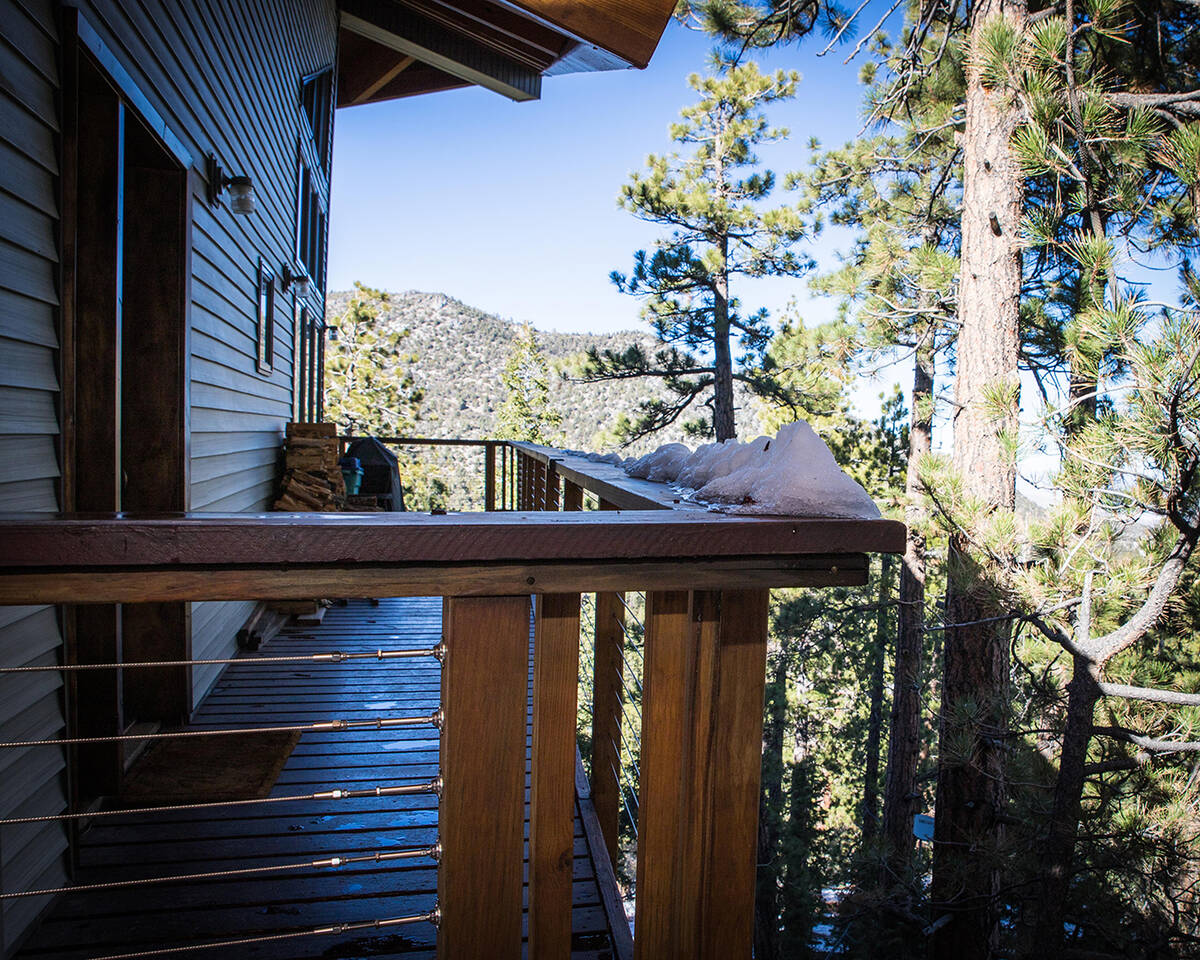 The 3,349-square-foot, three-level home off-grid cabin has a 8,245-foot elevation, and is near ...