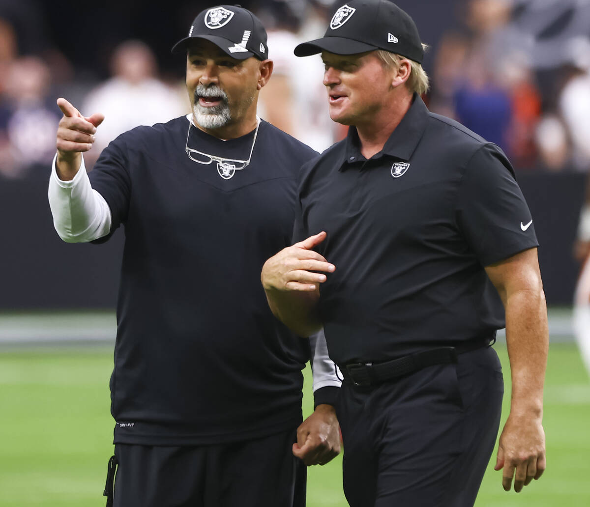 Rick Bisaccia, who was named interim head coach for the Raiders, is pictured with former head c ...