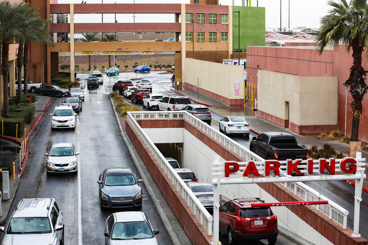 Shoppers enter the parking garage at the Las Vegas South Premium Outlets on Thursday, Dec. 23, ...
