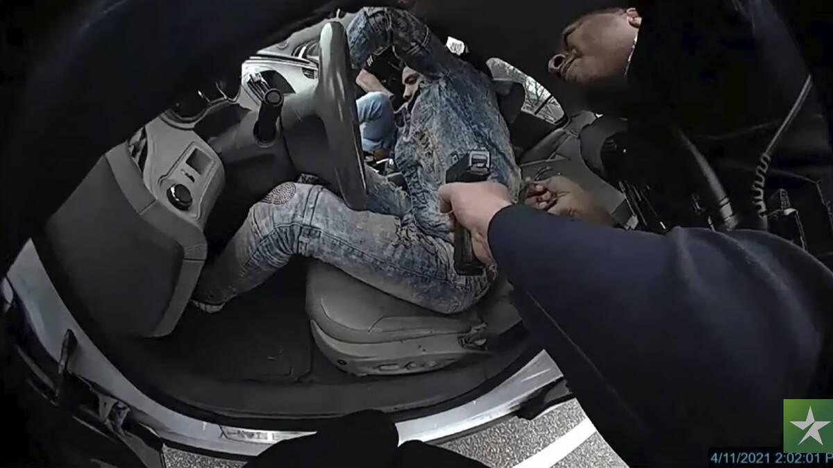 This still image taken from from police body cam video shows Daunte Wright during a traffic sto ...