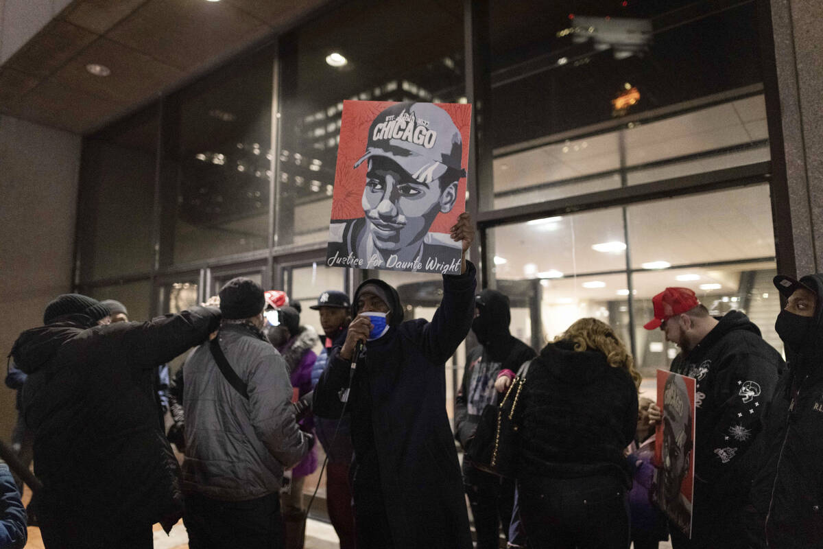 Protesters gather alongside the family of Daunte Wright outside of the Hennepin County Governme ...