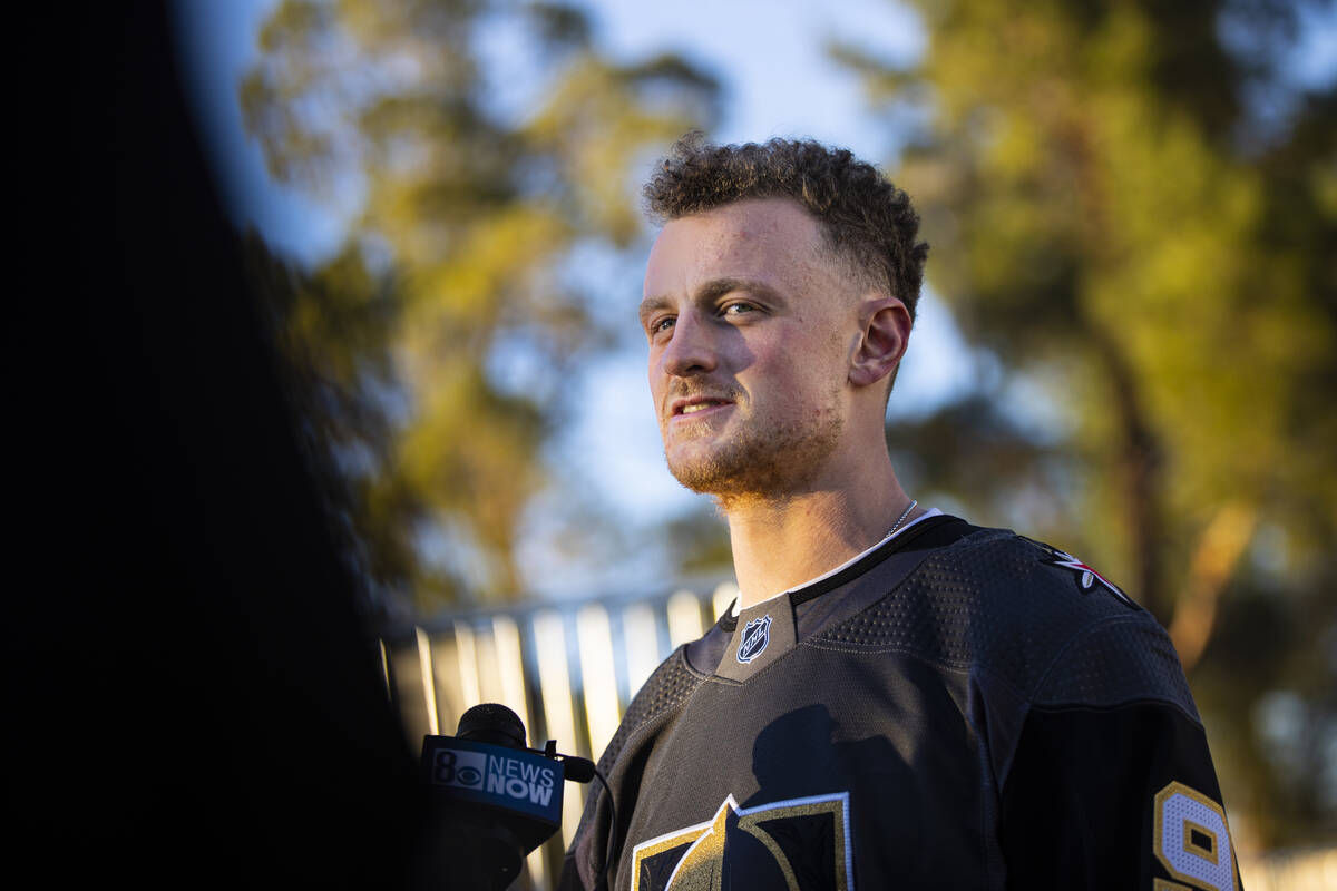 Newly acquired Golden Knights center Jack Eichel talks with members of the media during a break ...