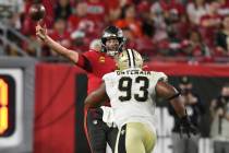 Tampa Bay Buccaneers quarterback Tom Brady (12) throws a pass as he is pressured by New Orleans ...