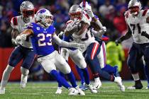 New England Patriots running back Damien Harris (37) carries the ball during the first half of ...