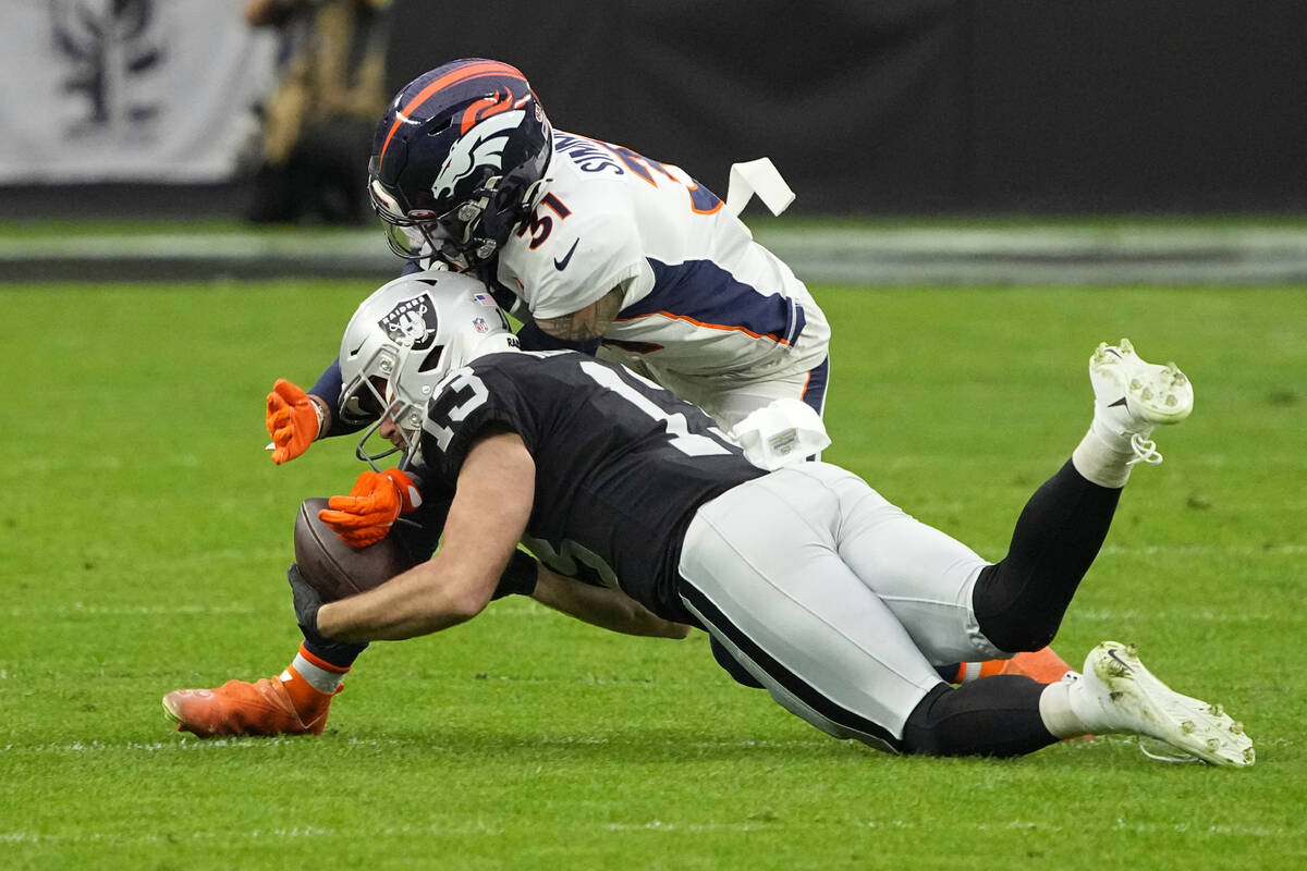 Las Vegas Raiders wide receiver Hunter Renfrow (13) catches a pass against Denver Broncos free ...