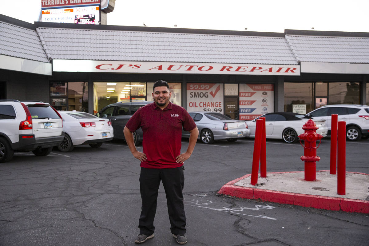 Carlos Sosa, owner and operator at the family-run CJ's Auto Repair shop, poses for a portrait n ...